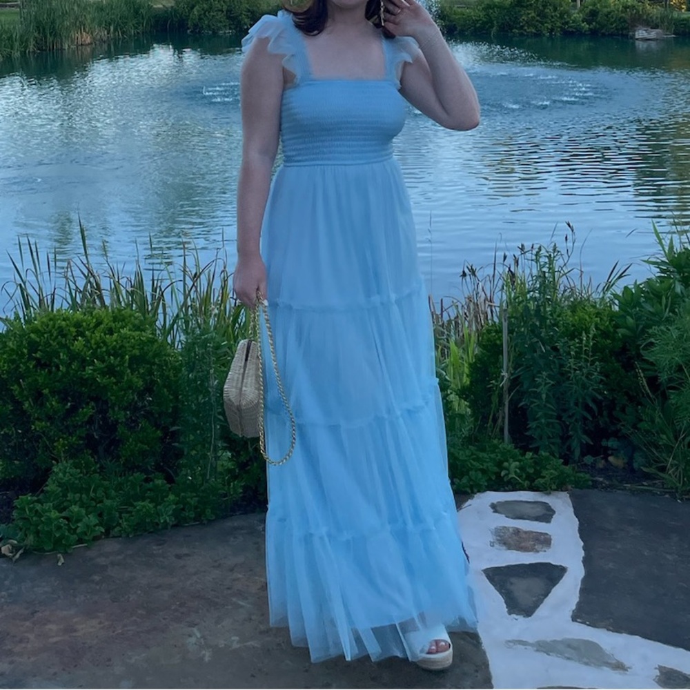 Blue tulle tiered maxi dress with a smocked bodice and tank ruffle sleeves!